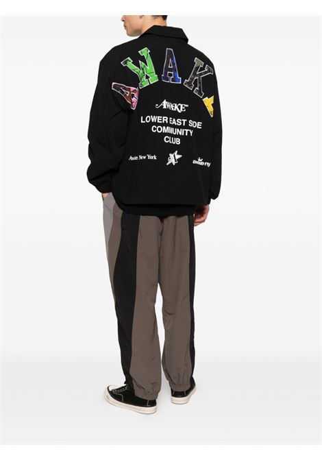 giacca l.e.s. community caoches uomo nera AWAKE NY | AWK-SP26-OT003BL